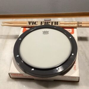 Remo Practice Pad with Vic Firth Drumsticks